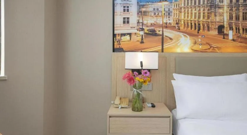 Bed in Vienna Hotel Nanning Train Station