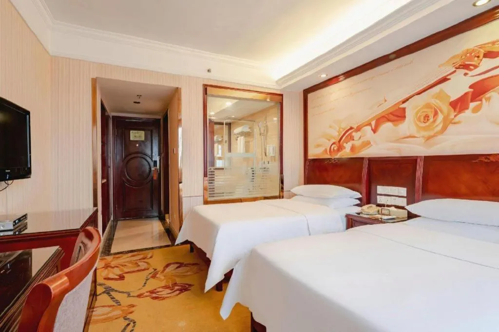 Bed in Vienna Hotel Nanning Train Station