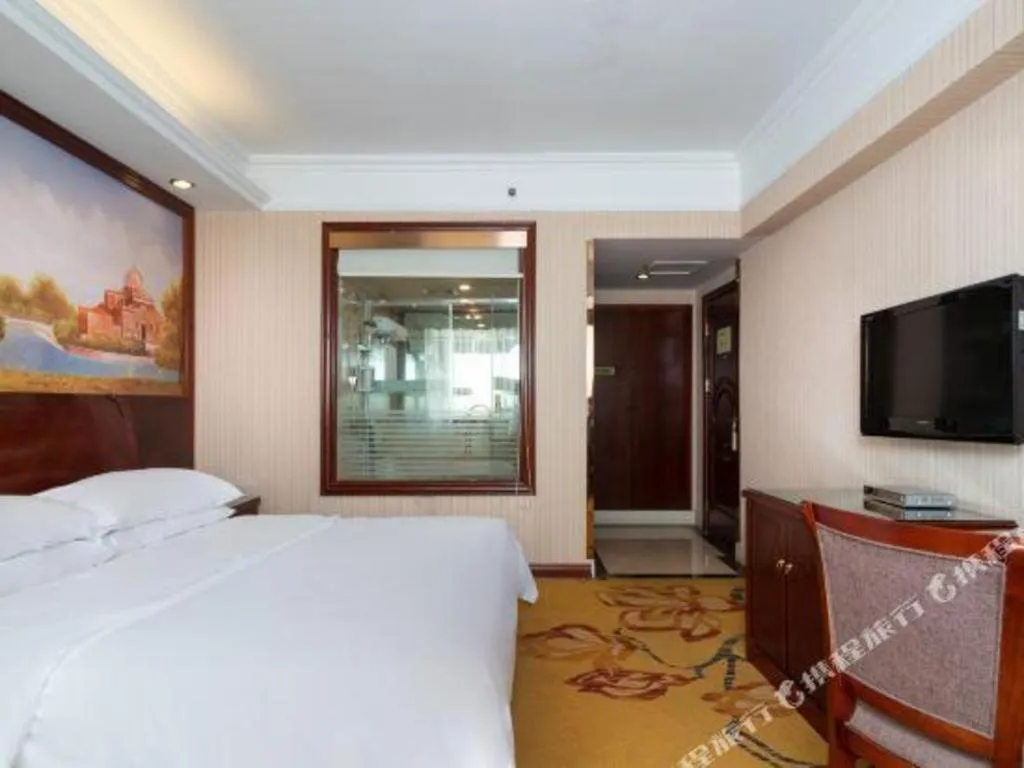 Bed in Vienna Hotel Nanning Train Station