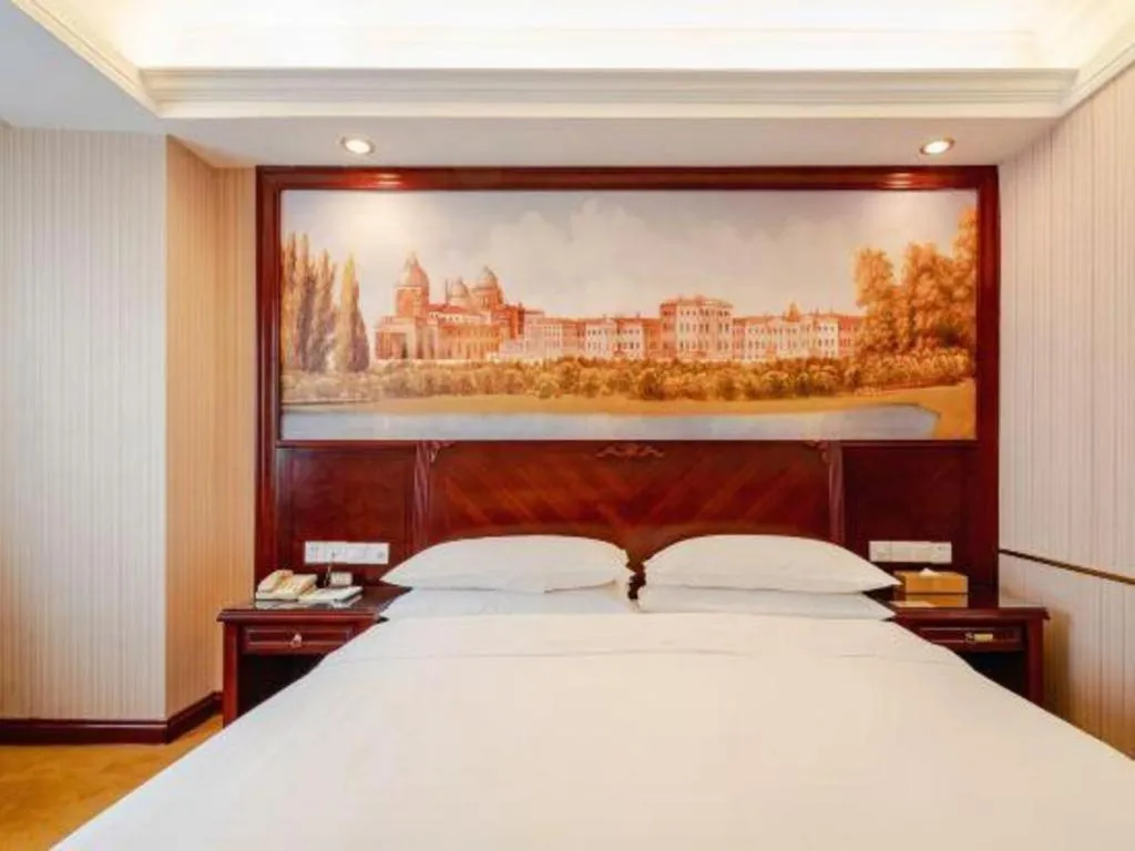 Bed in Vienna Hotel Nanning Train Station