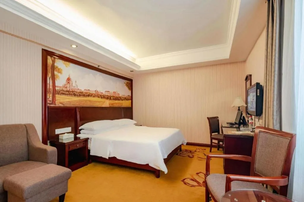 Bed in Vienna Hotel Nanning Train Station