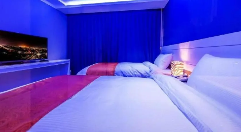 Bed in Galaxy Hotel