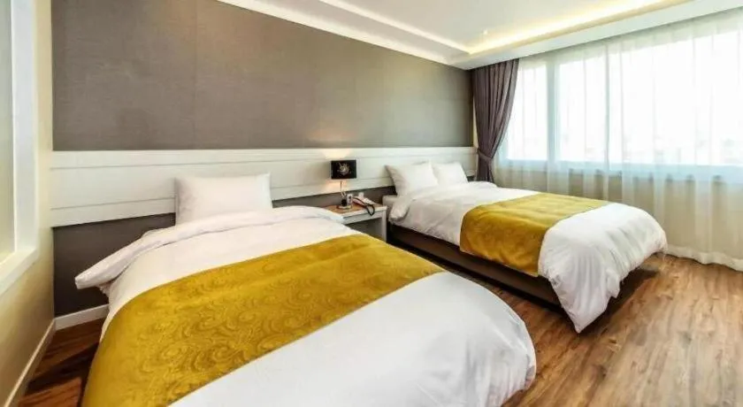 Bed in Galaxy Hotel