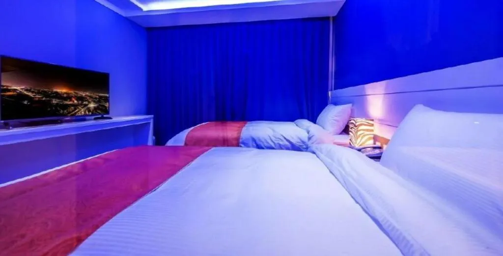 Bed in Galaxy Hotel