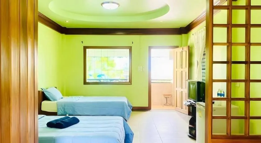 Bed in Phuphan Park Hotel