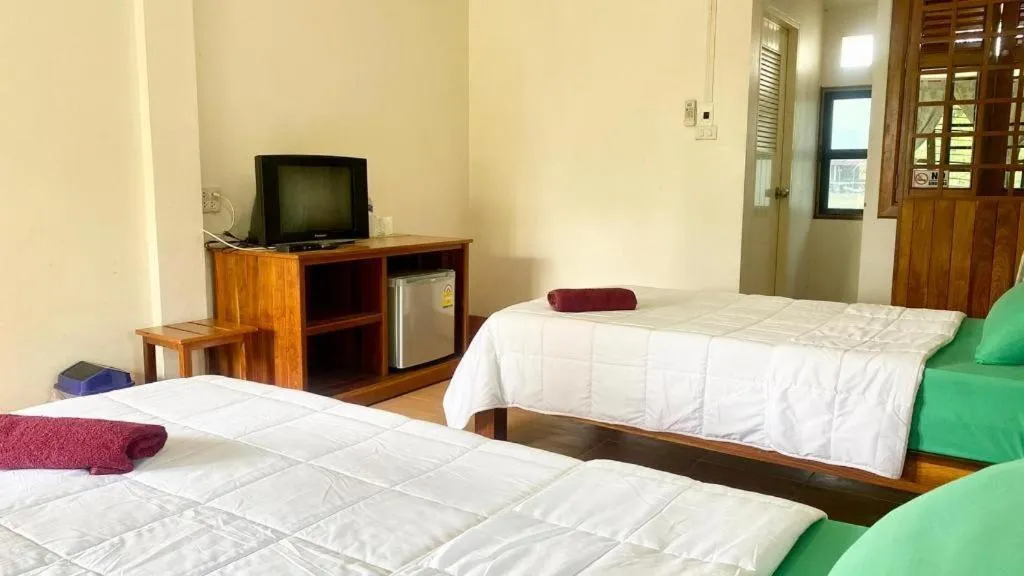 Bed in Phuphan Park Hotel