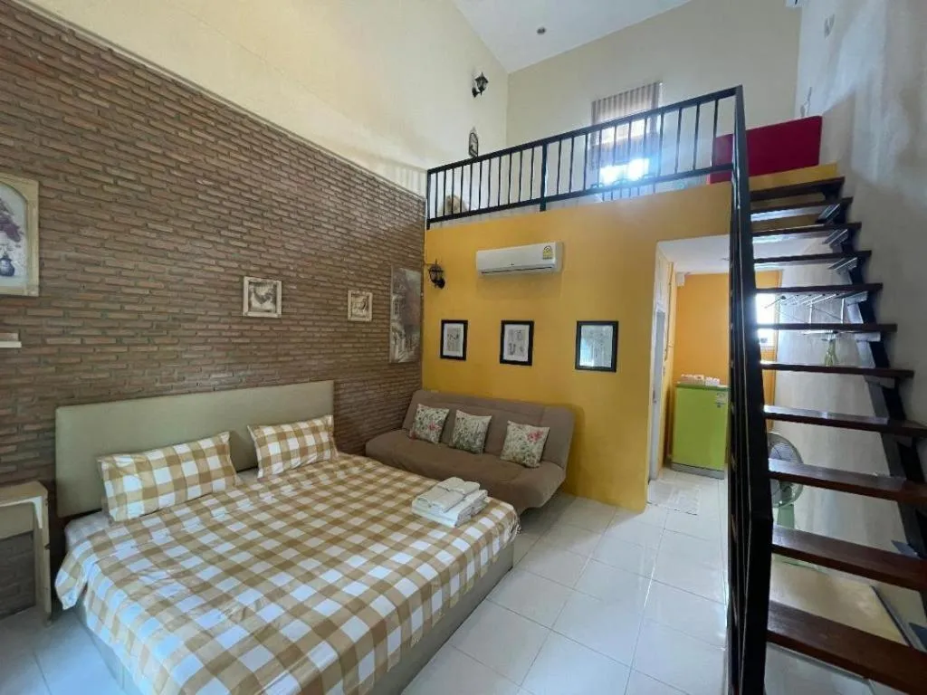 Bed in The Color Resort Amphawa