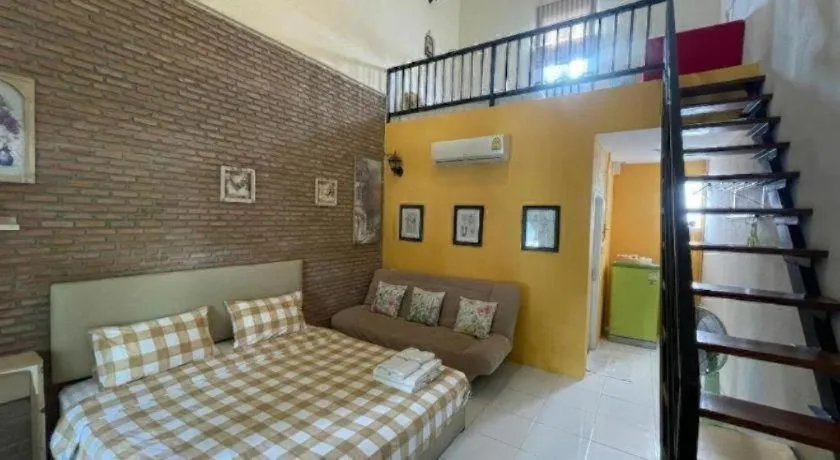 Bed in The Color Resort Amphawa