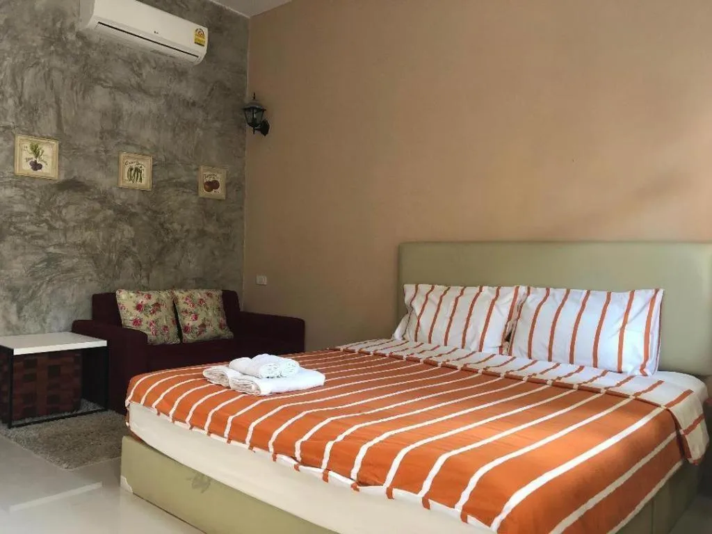 Bed in The Color Resort Amphawa