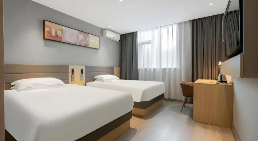 Bed in Jinjiang Inn Quanzhou West Street Kaiyuan Temple