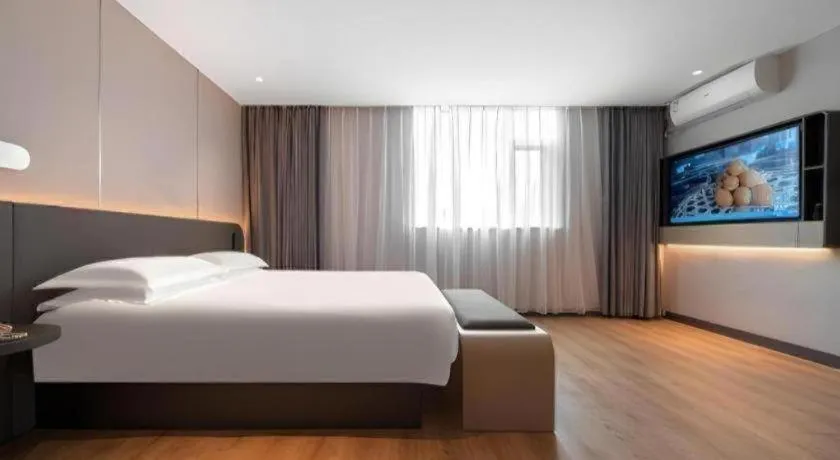 Bed in Jinjiang Inn Quanzhou West Street Kaiyuan Temple