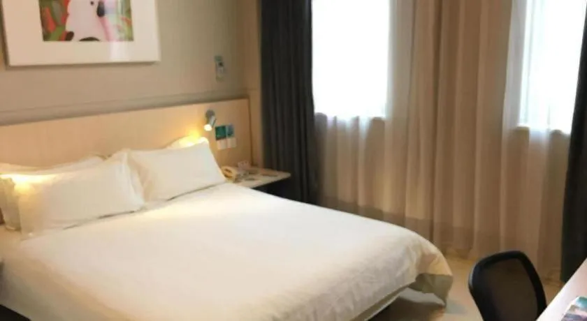 Bed in Jinjiang Inn Cixi Intime City Shanglinfang Pedestrian Street