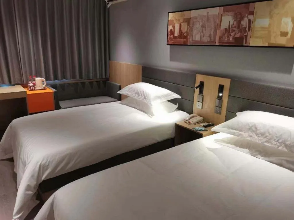 Bed in Jinjiang Inn Cixi Intime City Shanglinfang Pedestrian Street