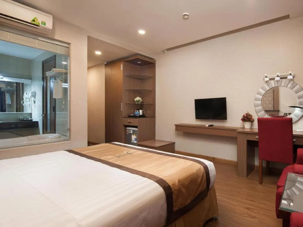 Bed in Royal Palace Hotel