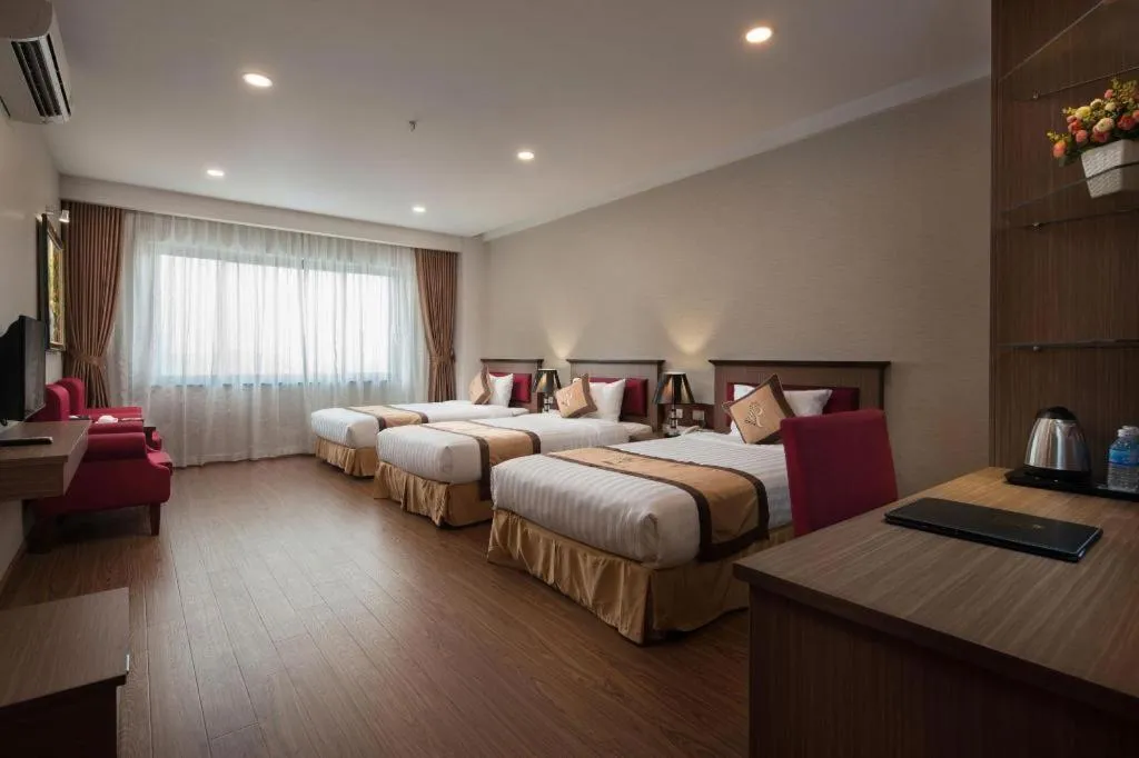 Bed in Royal Palace Hotel