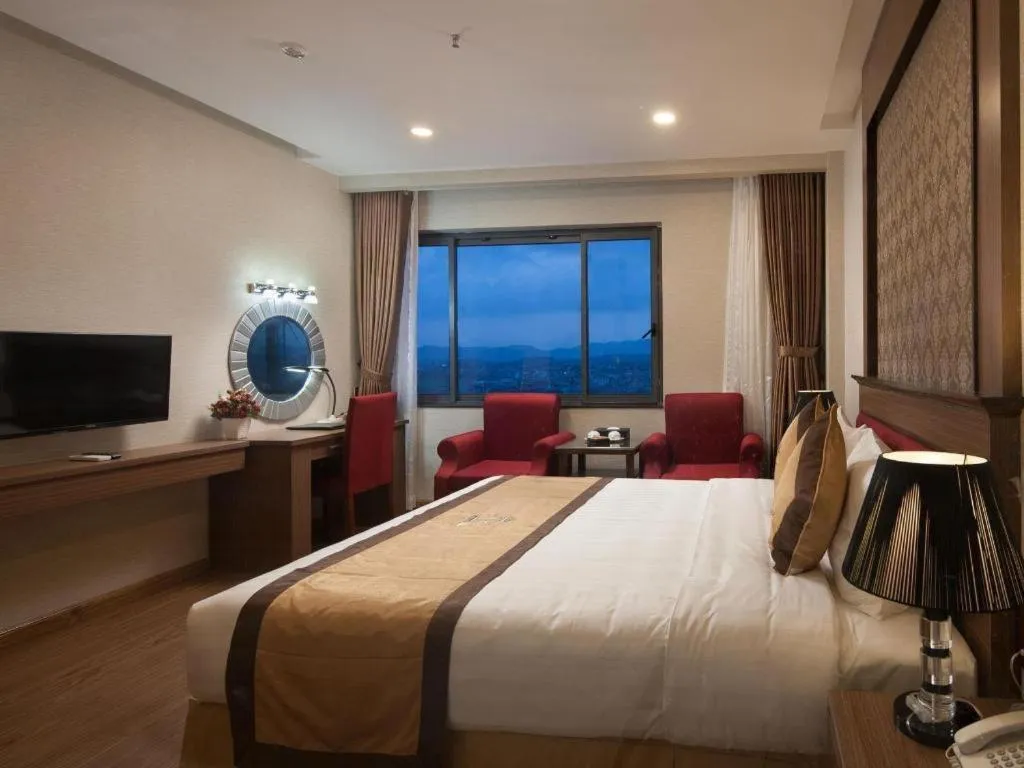 Bed in Royal Palace Hotel