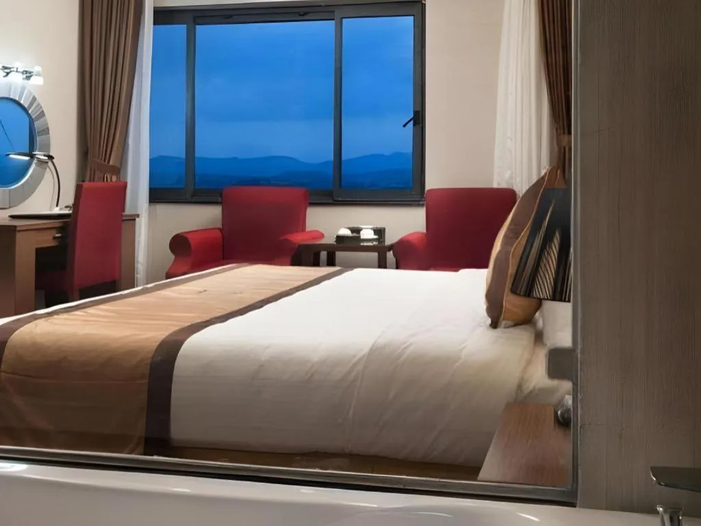 Bed in Royal Palace Hotel