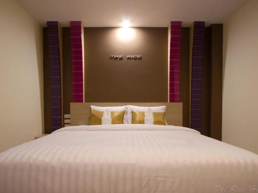 Bed in The Rice Hotel