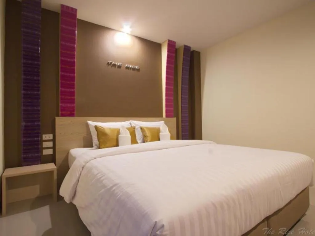 Bed in The Rice Hotel