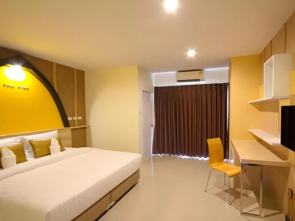 Bed in The Rice Hotel