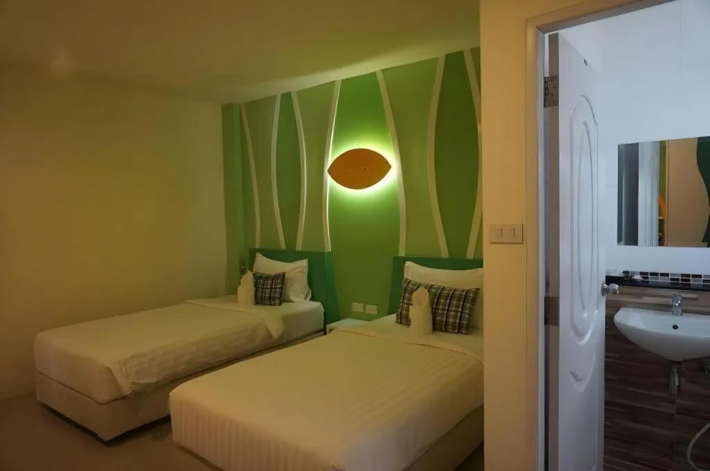 Bed in The Rice Hotel