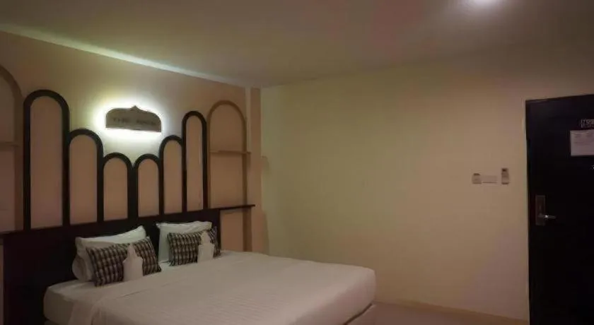 Bed in The Rice Hotel