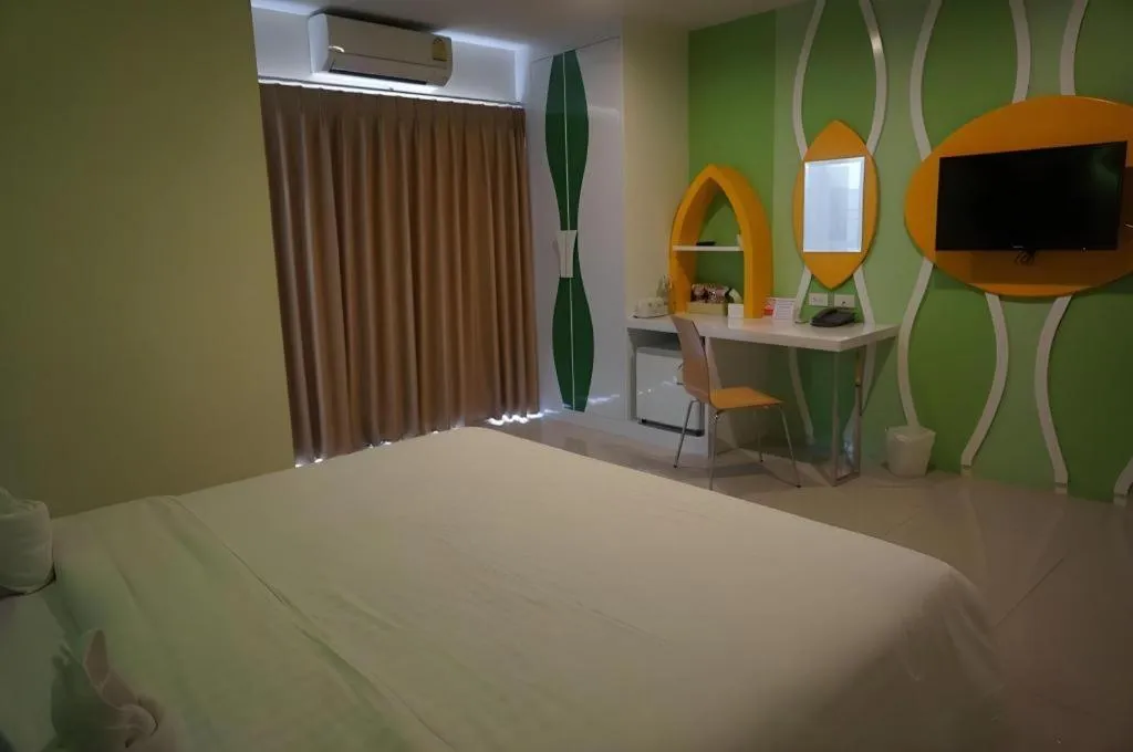 Bed in The Rice Hotel