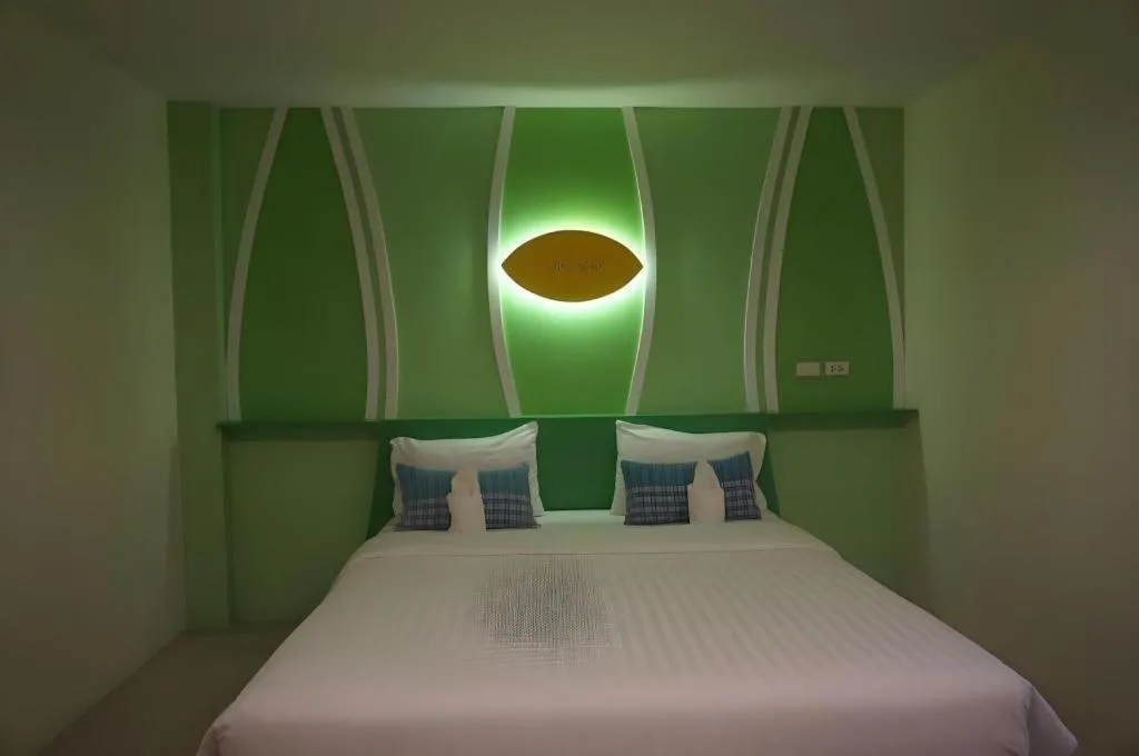 Bed in The Rice Hotel