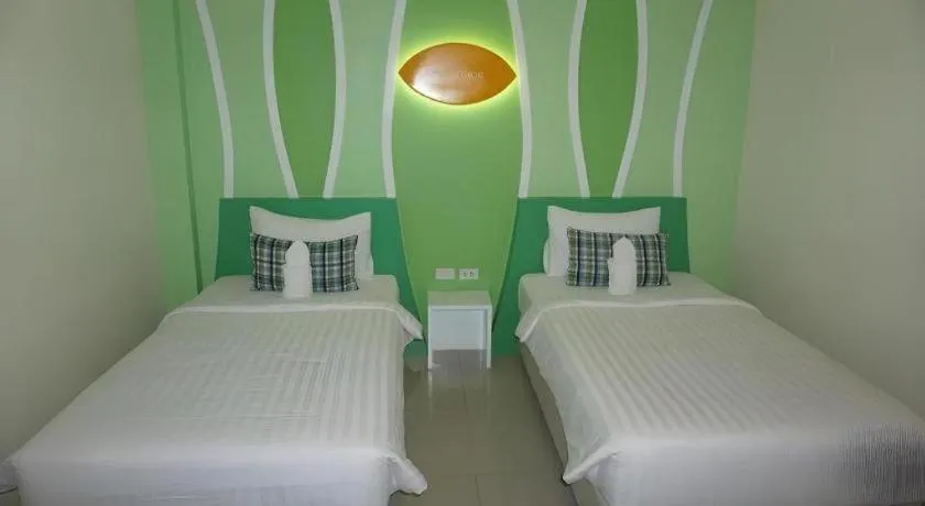 Bed in The Rice Hotel