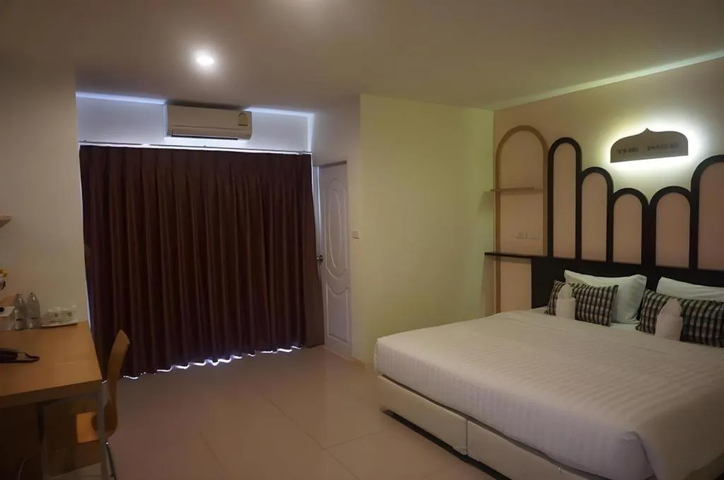 Bed in The Rice Hotel