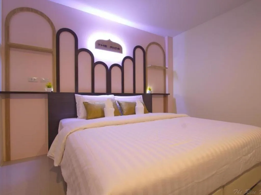 Bed in The Rice Hotel