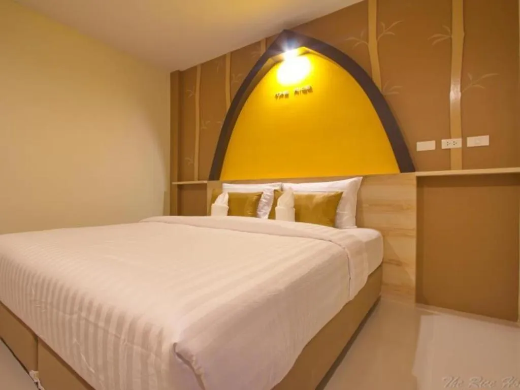 Bed in The Rice Hotel