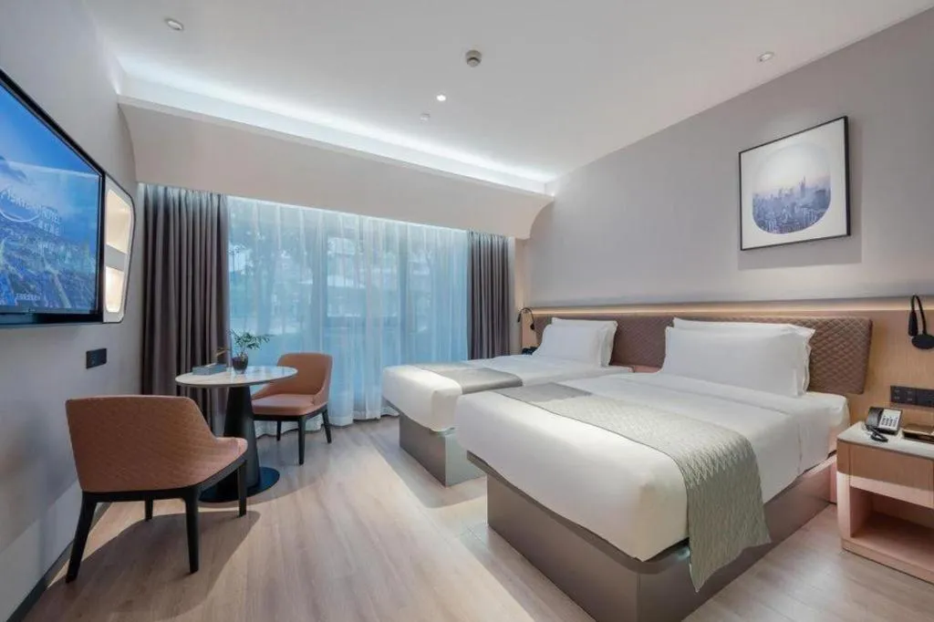 Bed in Home Inn Plus Shanghai Pudong Airport Chuansha Branch