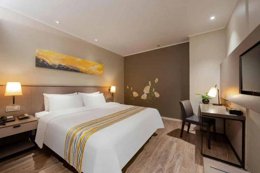 Bed in Home Inn Plus Shanghai Pudong Airport Chuansha Branch