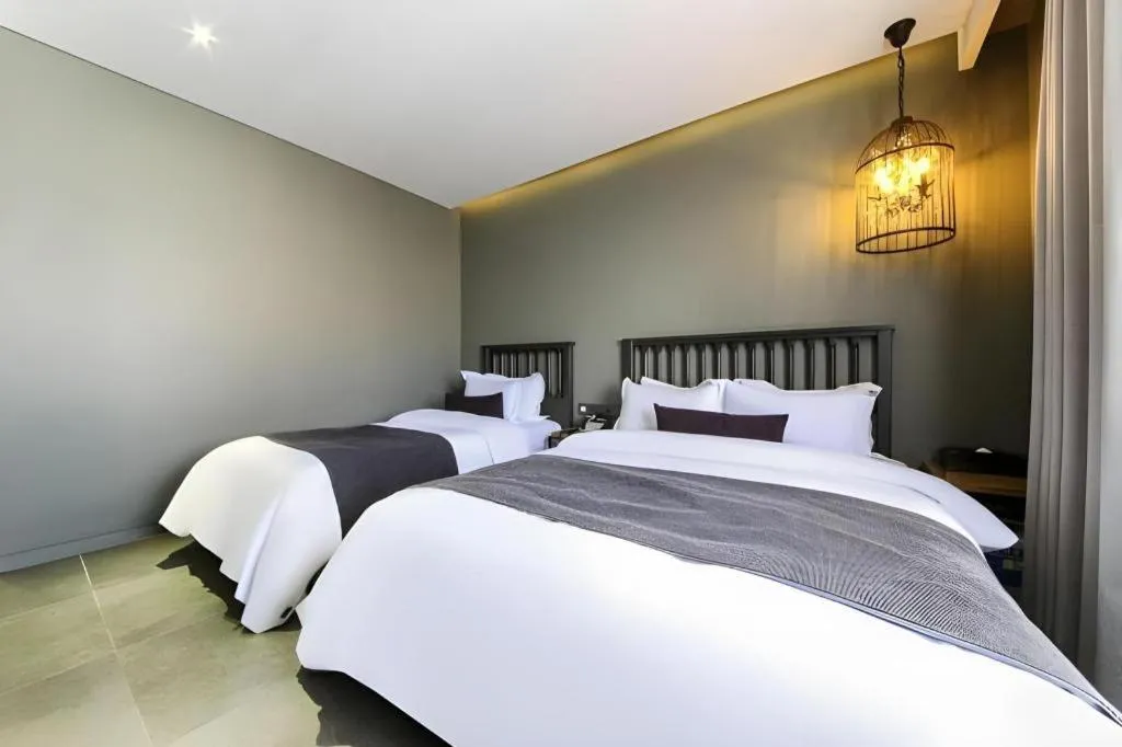 Bed in Daejeon Namoo Hotel