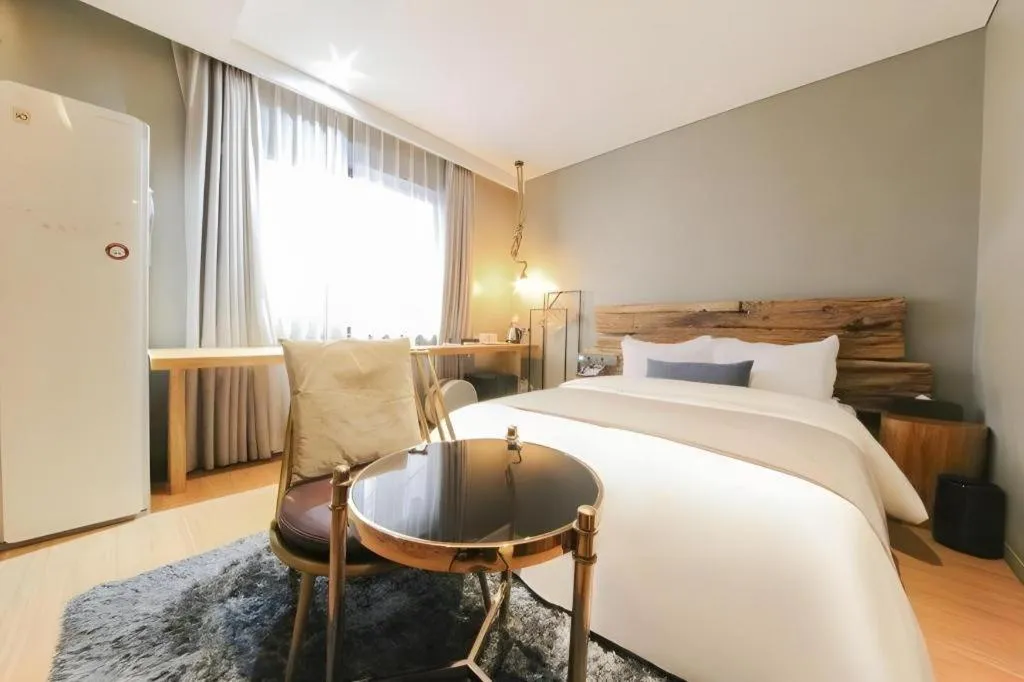 Bed in Daejeon Namoo Hotel