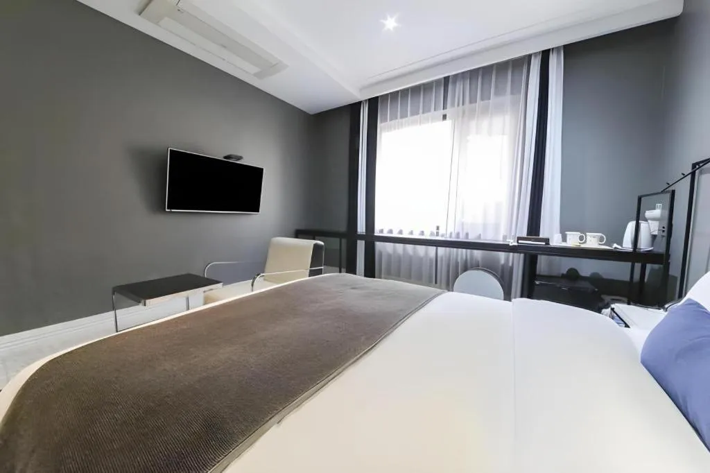 Bed in Daejeon Namoo Hotel