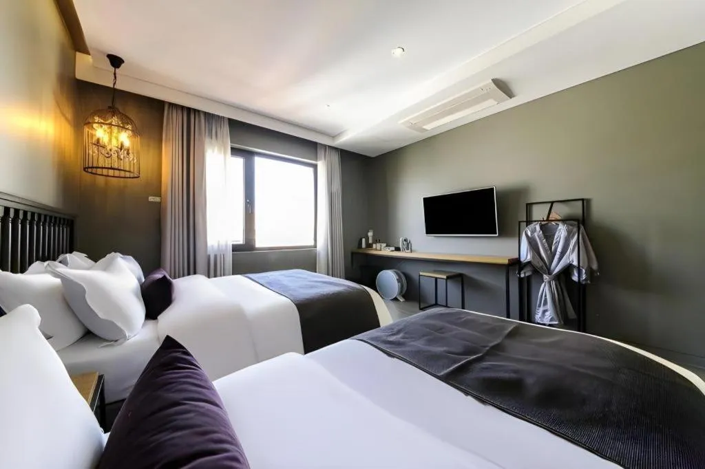 Bed in Daejeon Namoo Hotel