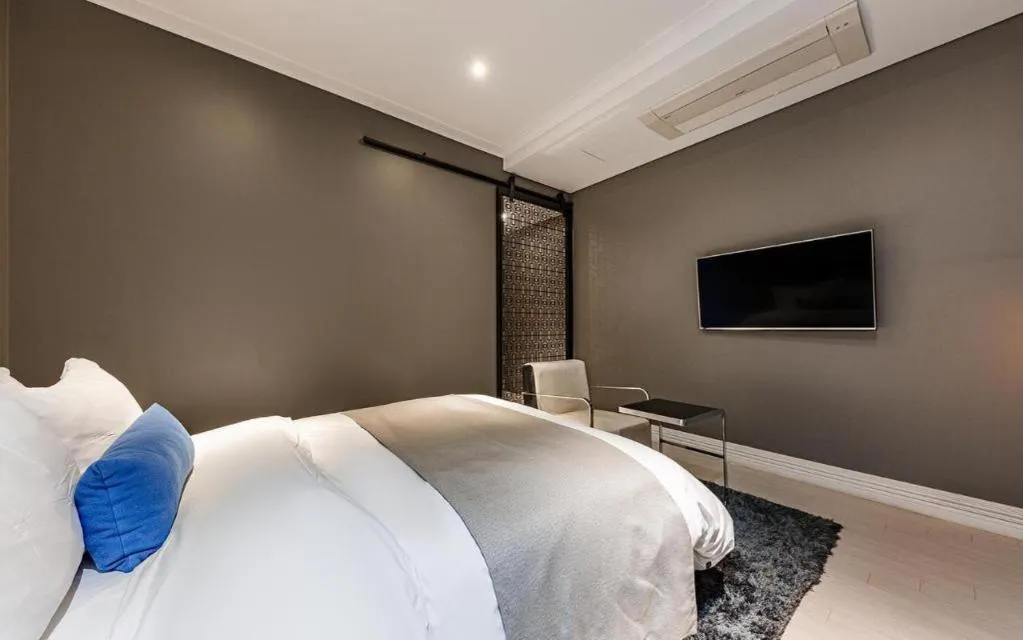 Bed in Daejeon Namoo Hotel