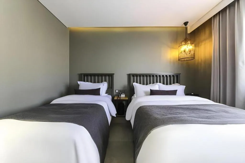 Bed in Daejeon Namoo Hotel