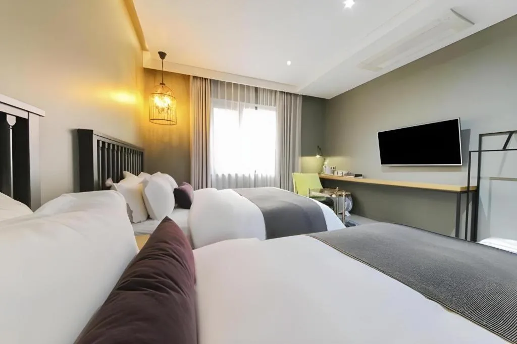 Bed in Daejeon Namoo Hotel