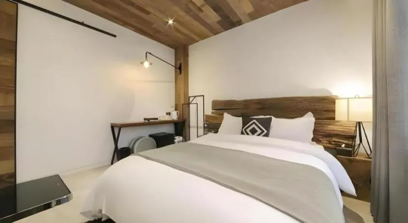 Bed in Daejeon Namoo Hotel