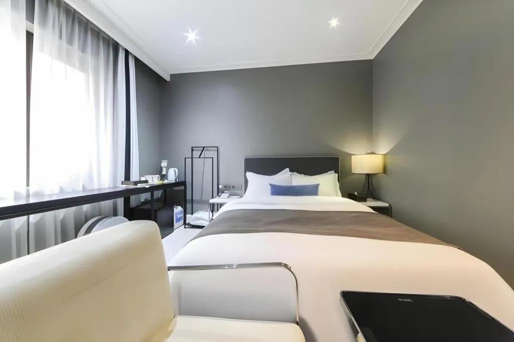 Bed in Daejeon Namoo Hotel