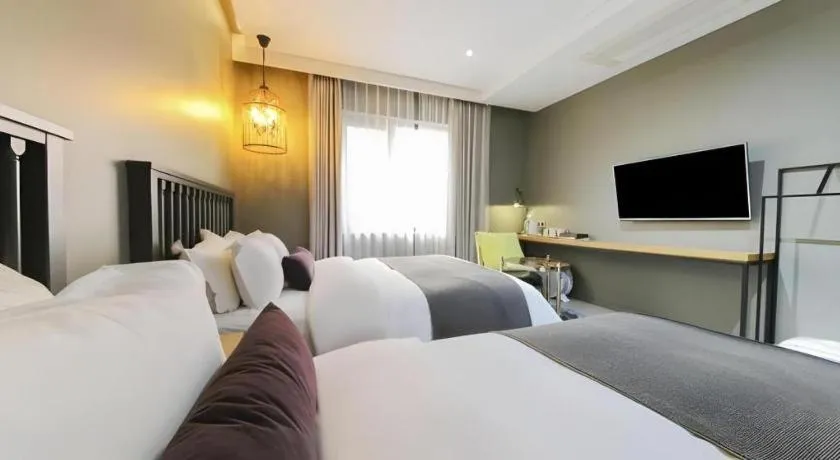 Bed in Daejeon Namoo Hotel