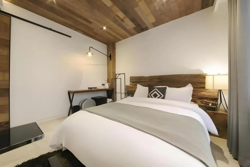 Bed in Daejeon Namoo Hotel