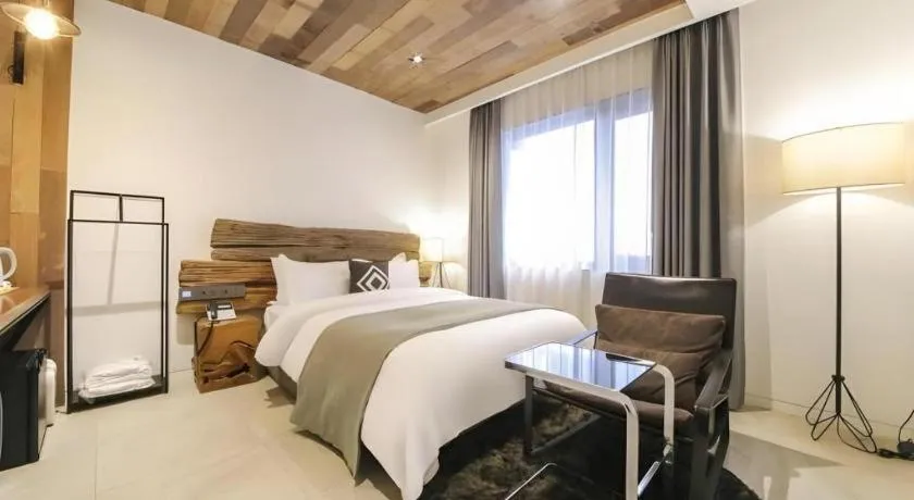 Bed in Daejeon Namoo Hotel