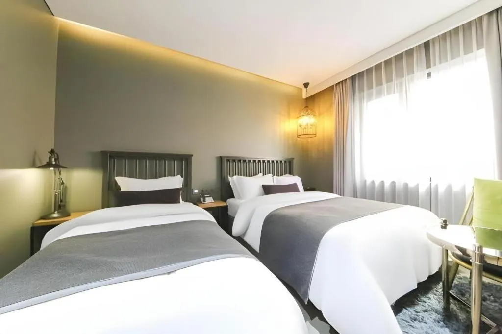 Bed in Daejeon Namoo Hotel