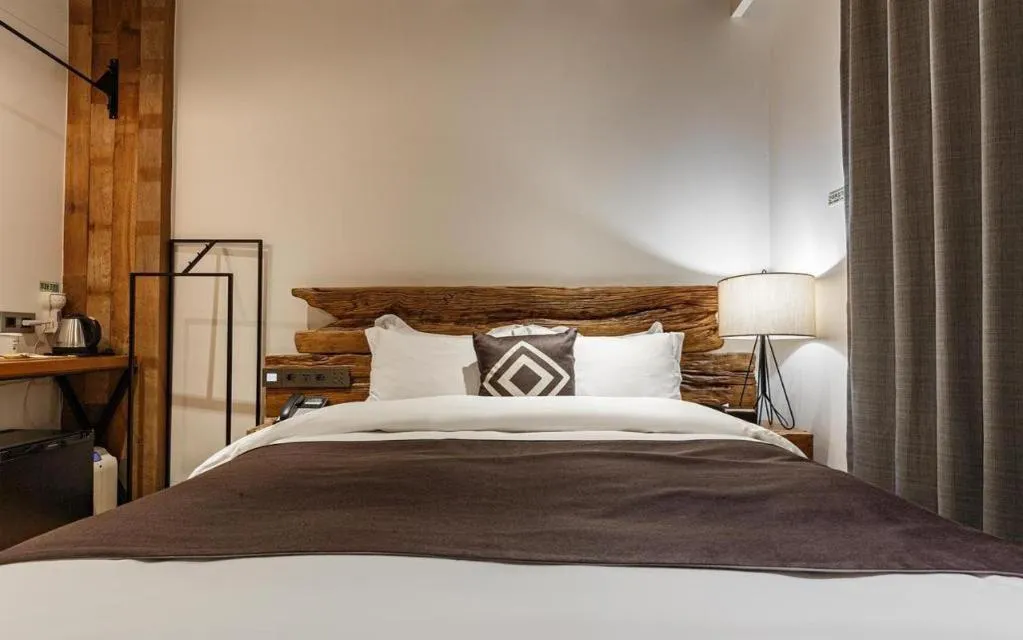 Bed in Daejeon Namoo Hotel