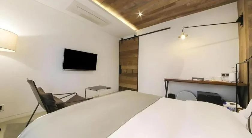 Bed in Daejeon Namoo Hotel