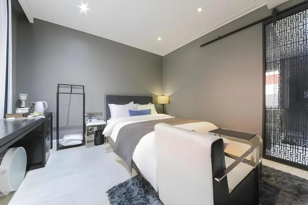 Bed in Daejeon Namoo Hotel